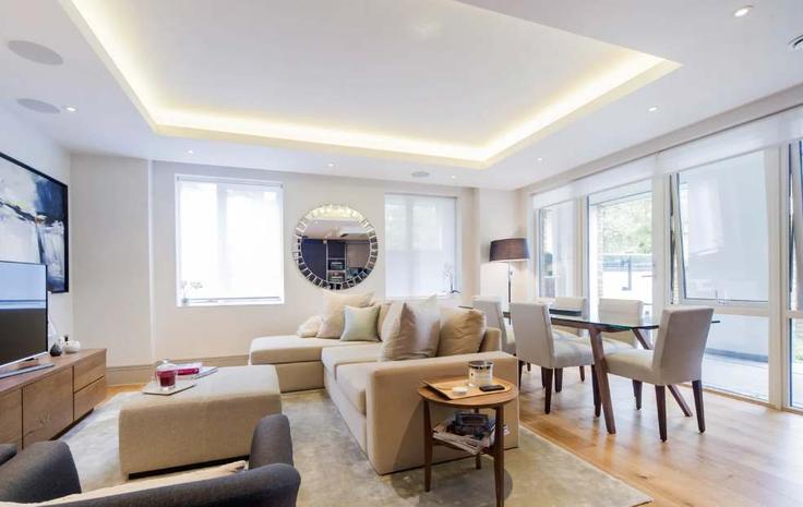 Salle de séjour élégante avec mobilier moderne dans un appartement à Building Cecil Grove - remotlys - 1621135 à London Borough of Camden, London