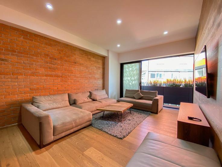 Elegant gestaltetes Wohnzimmer mit moderner Einrichtung in einer Wohnung im Building Calle Querétaro - rent-a-kent - 1225160 - MEX in Mexico City, Mexico City Elegant gestaltetes Wohnzimmer mit moderner Einrichtung in einer Wohnung im Building Calle Querétaro - rent-a-kent - 1225160 - MEX in Mexico City, Mexico City
