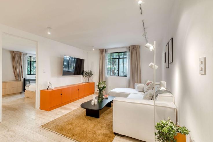 Sala de estar elegantemente projetada com móveis modernos em um apartamento no Building Campeche - rentinba - 1570156 em Mexico City, Mexico City Sala de estar elegantemente projetada com móveis modernos em um apartamento no Building Campeche - rentinba - 1570156 em Mexico City, Mexico City