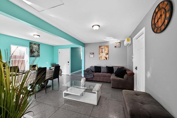 Elegantly designed living room with modern furnishings in an apartment at Building C Street - rexpertz-com - 1516231 in San Diego, San Diego