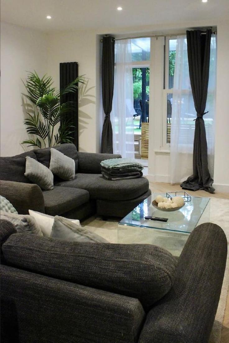 Elegante sala de estar con mobiliario moderno en un apartamento en Building Sinclair Road - rich-property-management - 1607809 en London Borough of Hammersmith and Fulham, London Elegante sala de estar con mobiliario moderno en un apartamento en Building Sinclair Road - rich-property-management - 1607809 en London Borough of Hammersmith and Fulham, London