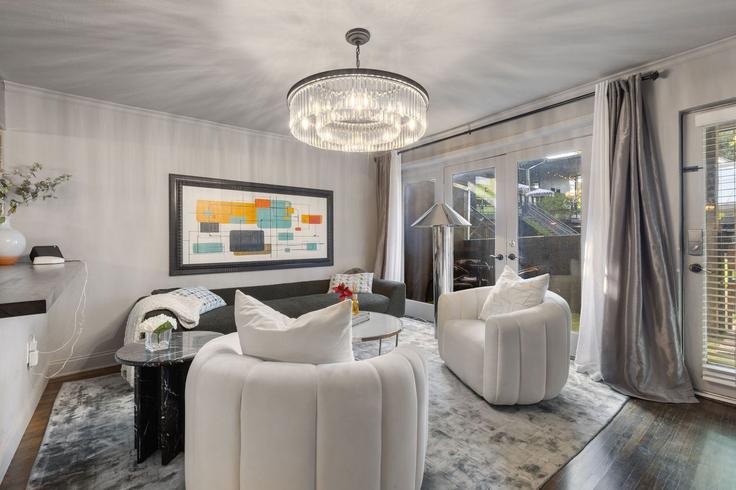 Elegantly designed living room with modern furnishings in an apartment at Building Gaston Avenue - ritzy-room-1 - 1571774 in Dallas, Dallas
