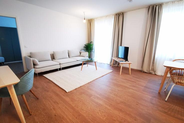 Sala de estar elegantemente projetada com móveis modernos em um apartamento no Building Forckenbeckstraße - rockchair-gmbh - 1253189 - BER em Berlin, Berlin Sala de estar elegantemente projetada com móveis modernos em um apartamento no Building Forckenbeckstraße - rockchair-gmbh - 1253189 - BER em Berlin, Berlin