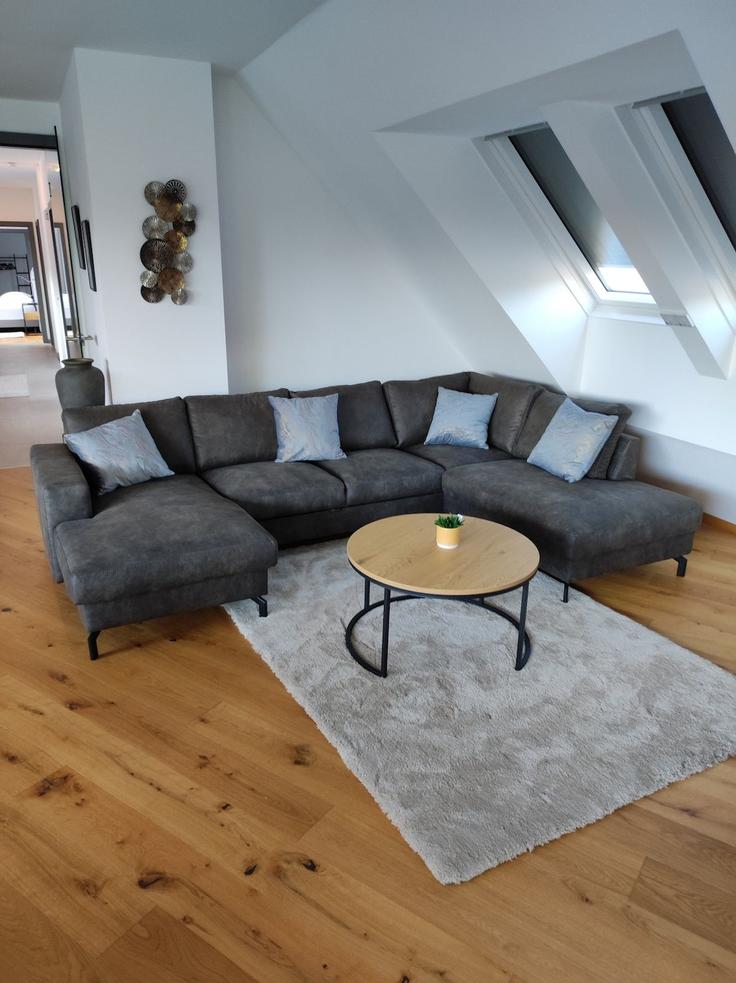 Elegante sala de estar con mobiliario moderno en un apartamento en Building Julius-Payer-Gasse - roksox-gmbh - 1540289 en Vienna, Vienna