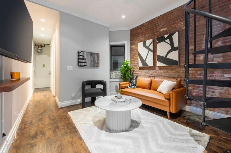Salle de séjour élégante avec mobilier moderne dans un appartement à Building East 23rd Street - roomrs-1 - 1644631 à Manhattan, New York Salle de séjour élégante avec mobilier moderne dans un appartement à Building East 23rd Street - roomrs-1 - 1644631 à Manhattan, New York