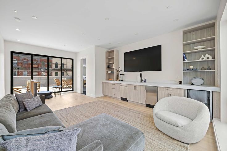 Elegantly designed living room with modern furnishings in an apartment at Building Manhattan Avenue - rovetravel - 1250266 - NYC in Manhattan, New York Elegantly designed living room with modern furnishings in an apartment at Building Manhattan Avenue - rovetravel - 1250266 - NYC in Manhattan, New York