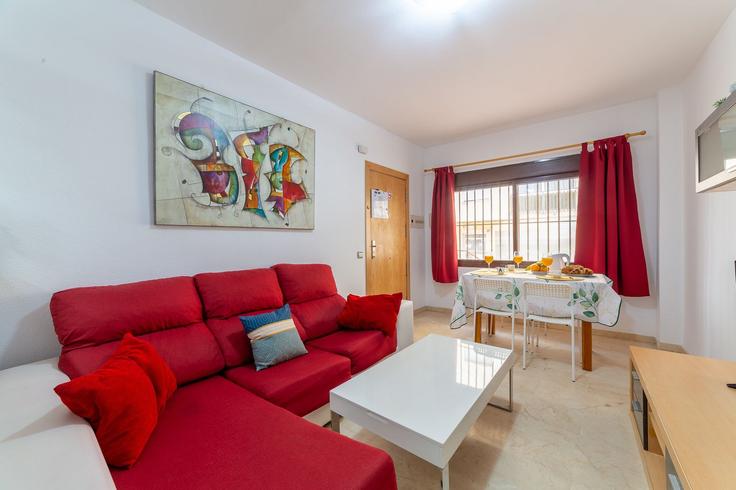 Elegant gestaltetes Wohnzimmer mit moderner Einrichtung in einer Wohnung im Building Calle Poeta Durban - salvador-martinez-muoz - 1331317 in Almería, Almería Elegant gestaltetes Wohnzimmer mit moderner Einrichtung in einer Wohnung im Building Calle Poeta Durban - salvador-martinez-muoz - 1331317 in Almería, Almería