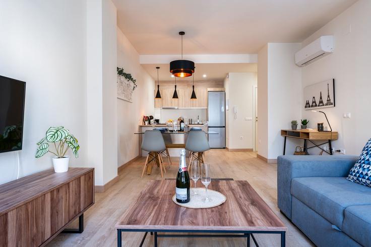 Elegant gestaltetes Wohnzimmer mit moderner Einrichtung in einer Wohnung im Building Calle Martínez de la Rosa - salvador-martinez-muoz - 1331275 in Bailén-Miraflores, Málaga Elegant gestaltetes Wohnzimmer mit moderner Einrichtung in einer Wohnung im Building Calle Martínez de la Rosa - salvador-martinez-muoz - 1331275 in Bailén-Miraflores, Málaga