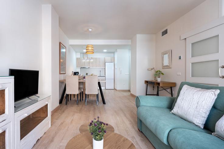 Elegantly designed living room with modern furnishings in an apartment at Building Calle Martínez de la Rosa - salvador-martinez-muoz - 1331316 in Bailén-Miraflores, Málaga