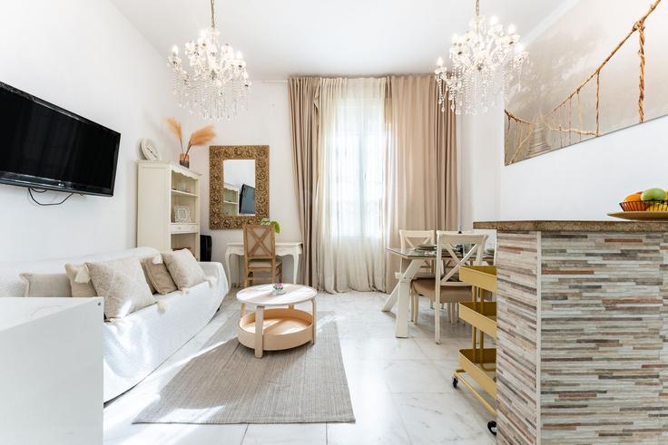 Elegant gestaltetes Wohnzimmer mit moderner Einrichtung in einer Wohnung im Building Calle Bustamante - salvador-martinez-muoz - 1331165 in Centro, Málaga Elegant gestaltetes Wohnzimmer mit moderner Einrichtung in einer Wohnung im Building Calle Bustamante - salvador-martinez-muoz - 1331165 in Centro, Málaga