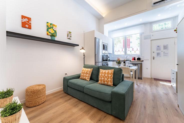 Building Calle Arenisca - salvador-martinez-muoz - 1331259 adresindeki bir dairede modern mobilyalarla zarif bir şekilde tasarlanmış oturma odası Cruz de Humilladero, Málaga Building Calle Arenisca - salvador-martinez-muoz - 1331259 adresindeki bir dairede modern mobilyalarla zarif bir şekilde tasarlanmış oturma odası Cruz de Humilladero, Málaga