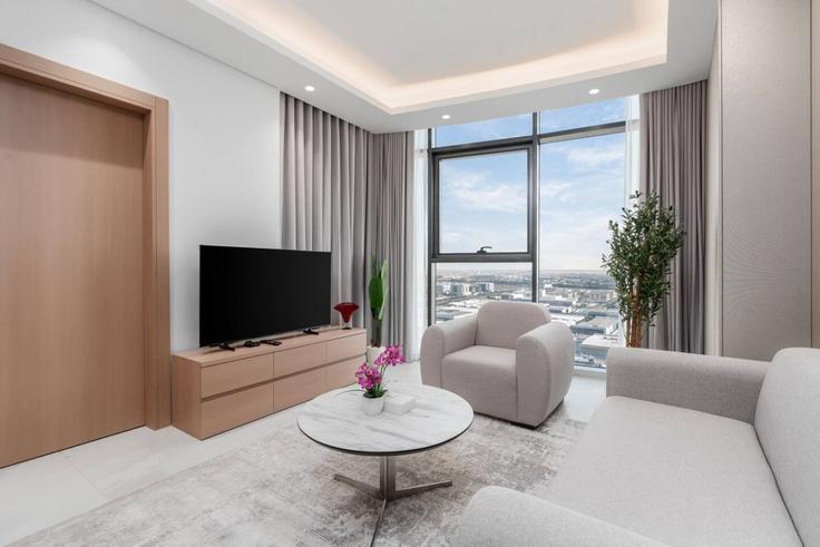 Salle de séjour élégante avec mobilier moderne dans un appartement à Building Orchid St - samaya-vacation-homes - 1366723 à Al Barsha South Fifth, Dubai