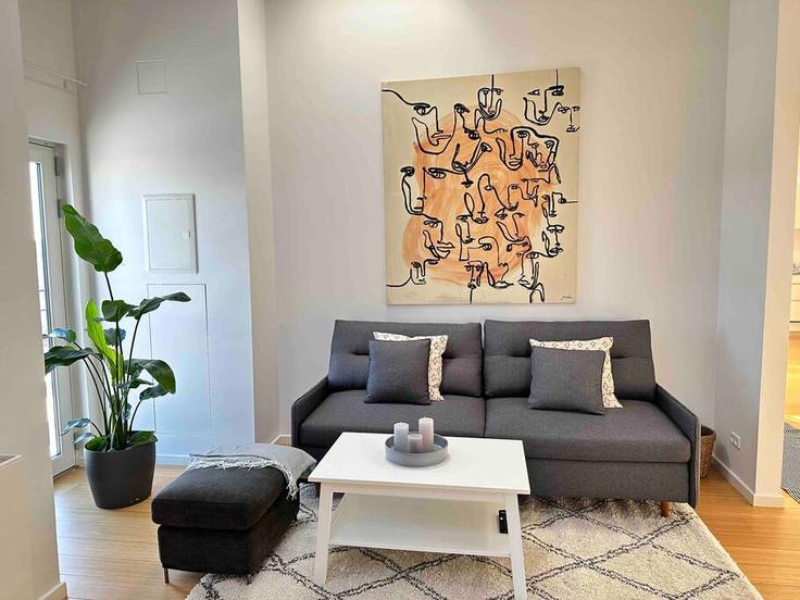 Elegante sala de estar con mobiliario moderno en un apartamento en Building Nygade - sdk-estates - 1309934 - DNK en Copenhagen, Copenhagen Elegante sala de estar con mobiliario moderno en un apartamento en Building Nygade - sdk-estates - 1309934 - DNK en Copenhagen, Copenhagen