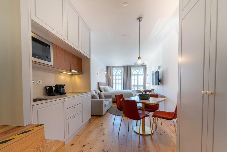 Salle de séjour élégante avec mobilier moderne dans un appartement à Building Largo do Paço - seapartamentos - 1343686 à Braga, Braga Salle de séjour élégante avec mobilier moderne dans un appartement à Building Largo do Paço - seapartamentos - 1343686 à Braga, Braga