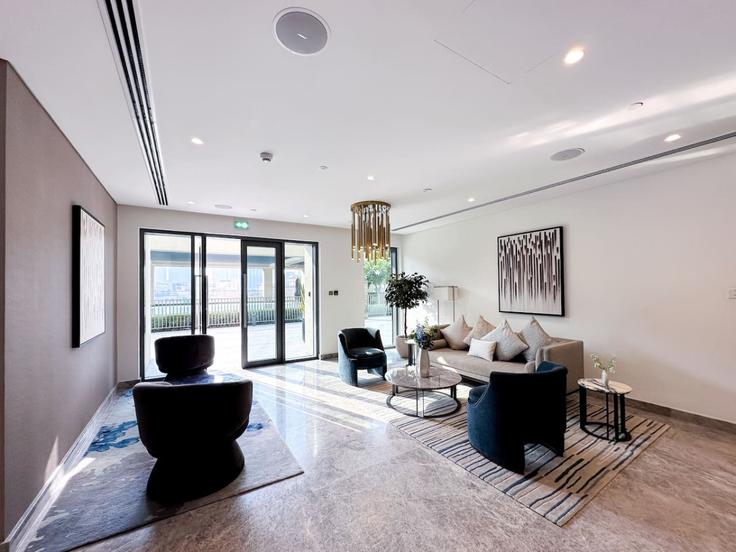 Elegante sala de estar con mobiliario moderno en un apartamento en Building Burj Khalifa Boulevard - second-best-homes - 1514643 en Burj Khalifa, Dubai