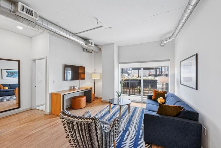 Nashville NashvilleのBuilding Lea Avenue - sentralsobro - 1226719のアパートメントにある、モダンな家具を備えたエレガントなデザインのリビングルーム Nashville NashvilleのBuilding Lea Avenue - sentralsobro - 1226719のアパートメントにある、モダンな家具を備えたエレガントなデザインのリビングルーム