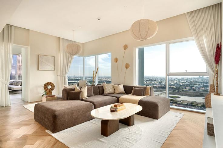 Elegant gestaltetes Wohnzimmer mit moderner Einrichtung in einer Wohnung im Building Marasi Drive - seraya-stays - 1499402 in Business Bay, Dubai