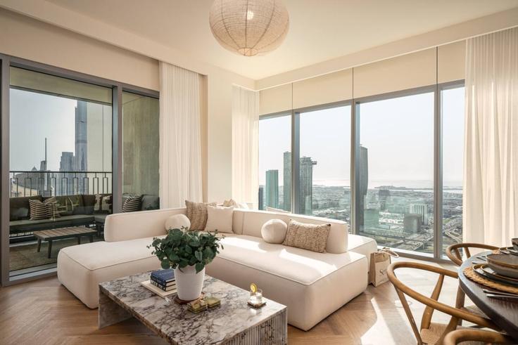 Salle de séjour élégante avec mobilier moderne dans un appartement à Building Tariaq Bedon Esm - seraya-stays - 1499410 à Za'abeel, Dubai