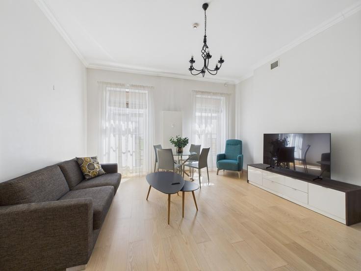 Salle de séjour élégante avec mobilier moderne dans un appartement à Building Elizabetes iela 22 - sia-bnbverit - 1524181 à Central District, Riga Salle de séjour élégante avec mobilier moderne dans un appartement à Building Elizabetes iela 22 - sia-bnbverit - 1524181 à Central District, Riga