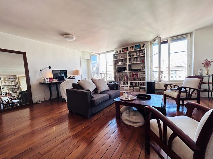 Elegantly designed living room with modern furnishings in an apartment at Building Rue du Faubourg du Temple - siegfried-vigier - 1538935 in 11th arrondissement, Paris