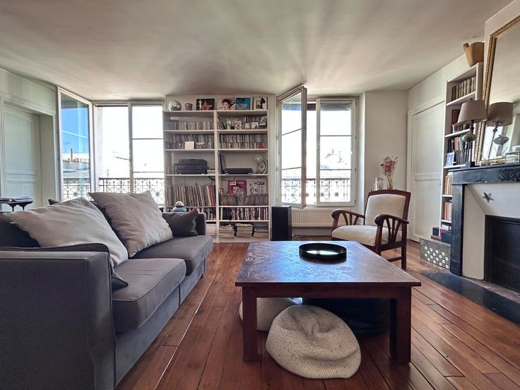 Salle de séjour élégante avec mobilier moderne dans un appartement à Building Rue du Faubourg du Temple - siegfried-vigier - 1538935 à 11th arrondissement, Paris