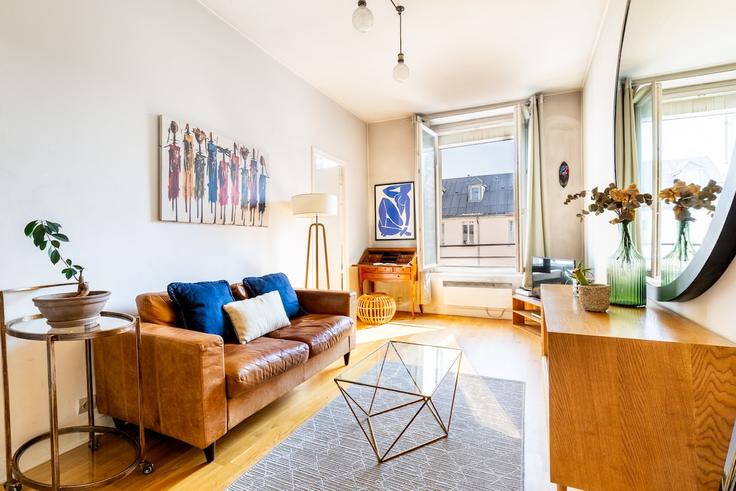 Elegantly designed living room with modern furnishings in an apartment at Building Impasse du 49 Faubourg Saint-Martin - siegfried-vigier - 1288589 - PAR in 10th arrondissement, Paris Elegantly designed living room with modern furnishings in an apartment at Building Impasse du 49 Faubourg Saint-Martin - siegfried-vigier - 1288589 - PAR in 10th arrondissement, Paris