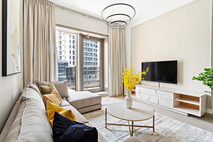 Elegantly designed living room with modern furnishings in an apartment at Building Al Sayorah Street - silkhaus - 1044188 - DXB in Dubai Marina, Dubai