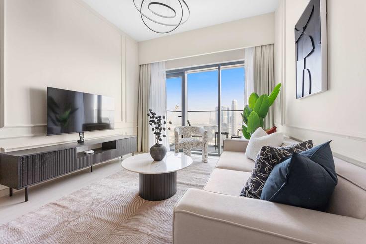 Salle de séjour élégante avec mobilier moderne dans un appartement à Building Burj Khalifa Boulevard - silkhaus - 1044283 - DXB à Downtown Dubai, Dubai