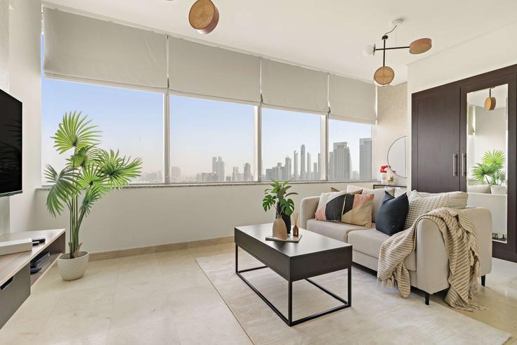 Sala de estar elegantemente projetada com móveis modernos em um apartamento no Building Al Mustaqbal Street - silkhaus - 1323703 em Trade Center, Dubai Sala de estar elegantemente projetada com móveis modernos em um apartamento no Building Al Mustaqbal Street - silkhaus - 1323703 em Trade Center, Dubai