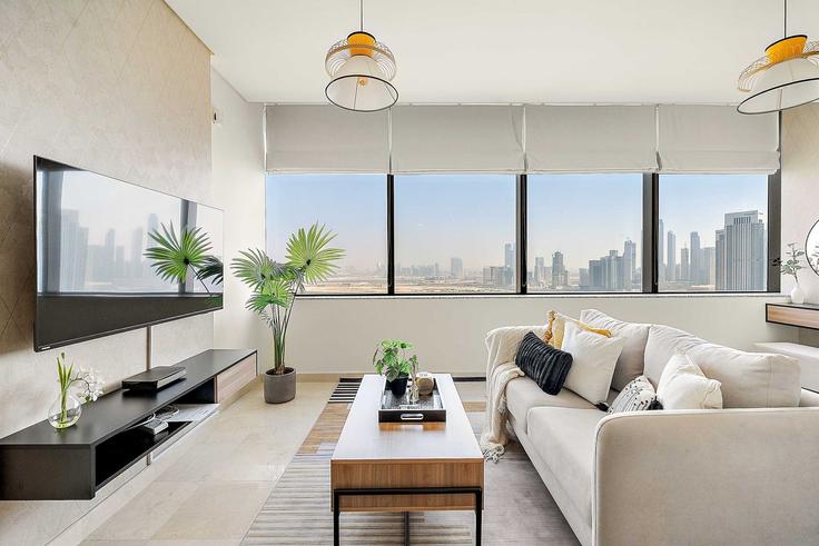 Sala de estar elegantemente projetada com móveis modernos em um apartamento no Building Al Mustaqbal Street - silkhaus - 1309806 - DXB em Trade Center, Dubai Sala de estar elegantemente projetada com móveis modernos em um apartamento no Building Al Mustaqbal Street - silkhaus - 1309806 - DXB em Trade Center, Dubai
