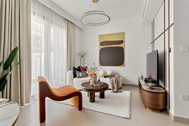 Elegante sala de estar con mobiliario moderno en un apartamento en Building Tariaq Bedon Esm - silkhaus - 1377376 en Al Hebiah Fourth, Dubai
