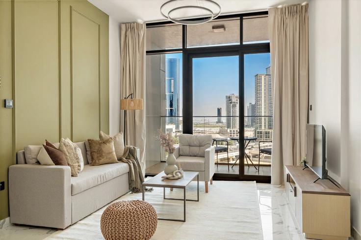 Sala de estar elegantemente projetada com móveis modernos em um apartamento no Building The Promenade - silkhaus - 1380465 em Al Maryah Island, Abu Dhabi
