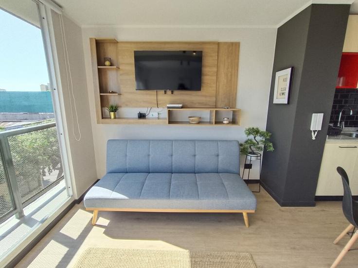 Santiago SantiagoのBuilding Roberto Espinoza - simply-haus - 1060637のアパートメントにある、モダンな家具を備えたエレガントなデザインのリビングルーム Santiago SantiagoのBuilding Roberto Espinoza - simply-haus - 1060637のアパートメントにある、モダンな家具を備えたエレガントなデザインのリビングルーム