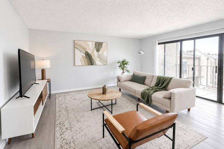 Wichita WichitaのBuilding North Rock Road - sleepover-inc - 1604790のアパートメントにある、モダンな家具を備えたエレガントなデザインのリビングルーム Wichita WichitaのBuilding North Rock Road - sleepover-inc - 1604790のアパートメントにある、モダンな家具を備えたエレガントなデザインのリビングルーム