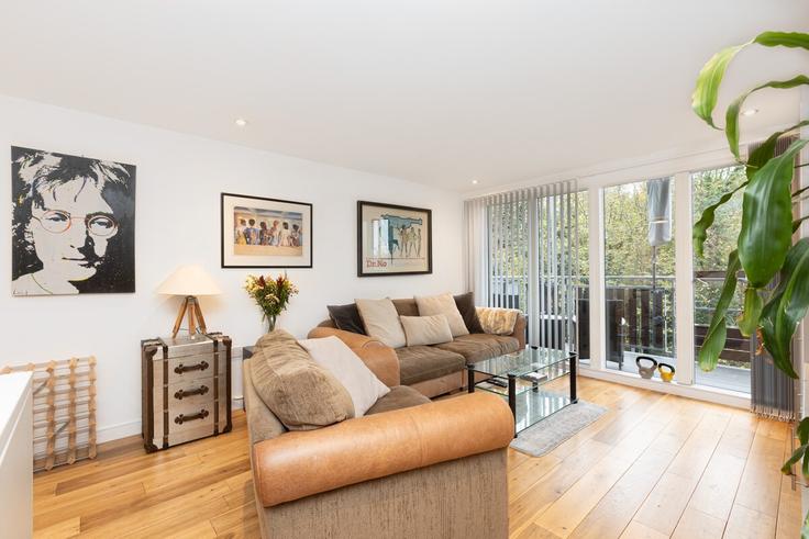 Elegantly designed living room with modern furnishings in an apartment at Building Woodlands Park Road - smart-host-group-ted - 1519817 in Royal Borough of Greenwich, London Elegantly designed living room with modern furnishings in an apartment at Building Woodlands Park Road - smart-host-group-ted - 1519817 in Royal Borough of Greenwich, London