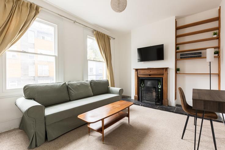 Sala de estar elegantemente projetada com móveis modernos em um apartamento no Building Algernon Road - smart-host-group-ted - 1513538 em London Borough of Lewisham, London Sala de estar elegantemente projetada com móveis modernos em um apartamento no Building Algernon Road - smart-host-group-ted - 1513538 em London Borough of Lewisham, London