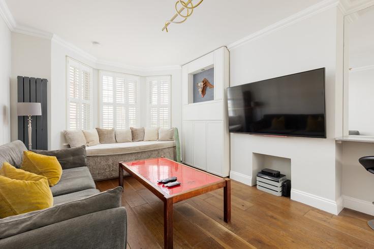 Elegante sala de estar con mobiliario moderno en un apartamento en Building Barnsbury Street - smart-host-group-ted - 1513505 en London Borough of Islington, London Elegante sala de estar con mobiliario moderno en un apartamento en Building Barnsbury Street - smart-host-group-ted - 1513505 en London Borough of Islington, London