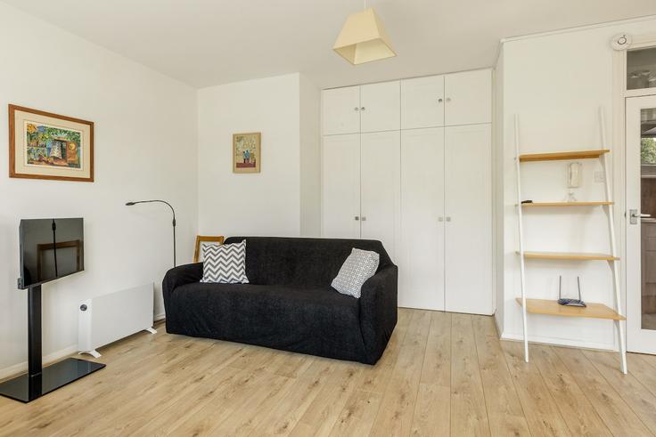 Salle de séjour élégante avec mobilier moderne dans un appartement à Building Putney Hill - smart-host-group-ted - 1513494 à London Borough of Wandsworth, London Salle de séjour élégante avec mobilier moderne dans un appartement à Building Putney Hill - smart-host-group-ted - 1513494 à London Borough of Wandsworth, London