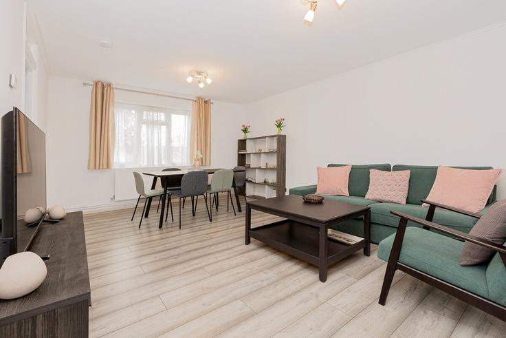 Elegantly designed living room with modern furnishings in an apartment at Building Bunns Lane - smart-host-group-ted - 1519819 in London Borough of Barnet, London