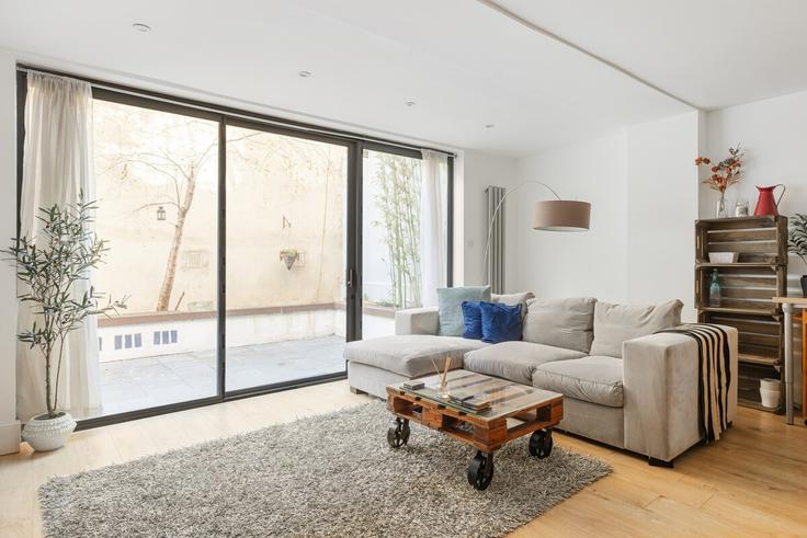 Elegante sala de estar con mobiliario moderno en un apartamento en Building Prebend Street - smart-host-group-ted - 1513435 en London Borough of Islington, London Elegante sala de estar con mobiliario moderno en un apartamento en Building Prebend Street - smart-host-group-ted - 1513435 en London Borough of Islington, London