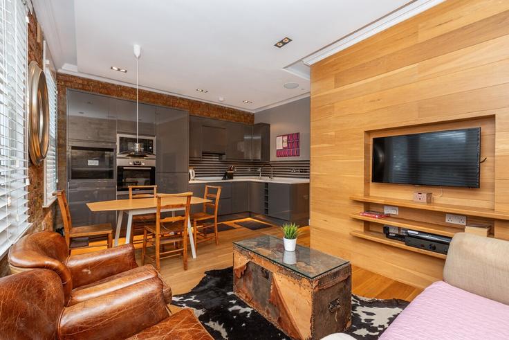 Salle de séjour élégante avec mobilier moderne dans un appartement à Building Upper Richmond Road - smart-host-group-ted - 1536460 à London Borough of Wandsworth, London