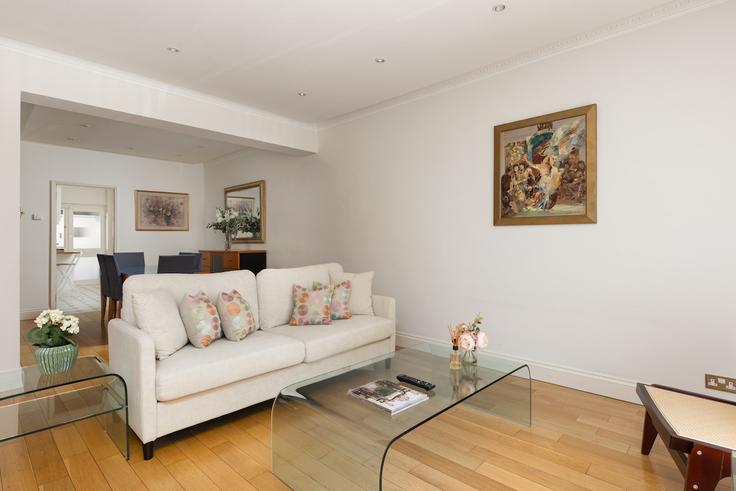 Elegantly designed living room with modern furnishings in an apartment at Building Princes Gate - smart-host-group-ted - 1548256 in City of Westminster, London