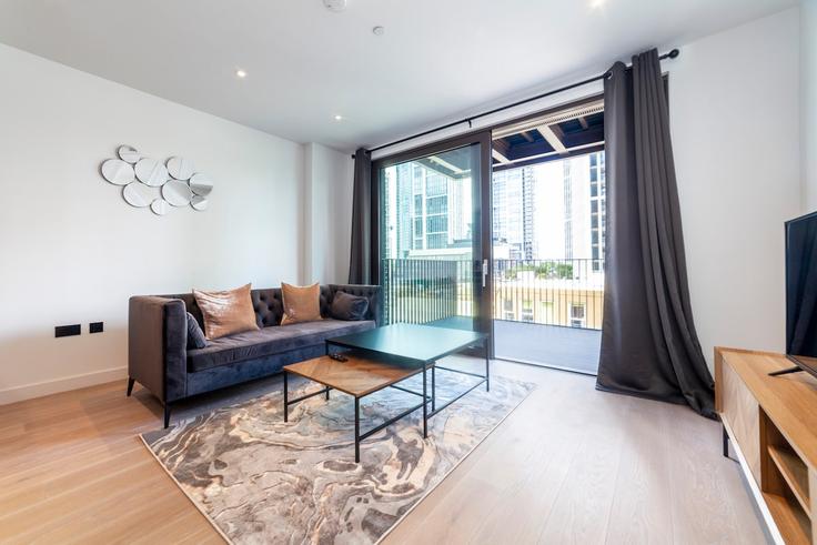 Elegantly designed living room with modern furnishings in an apartment at Building Wandsworth Road - smart-host-group-ted - 1513693 in London Borough of Wandsworth, London