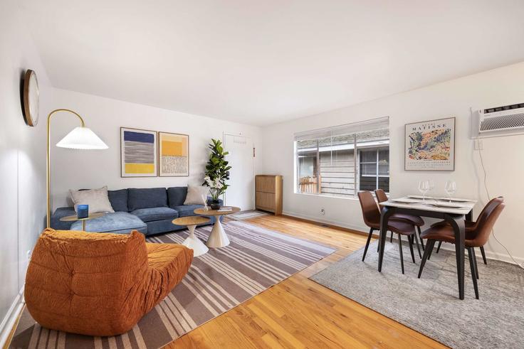 Elegantly designed living room with modern furnishings in an apartment at Building 35th Avenue Northeast - snowballrentals - 1571572 in Seattle, Seattle