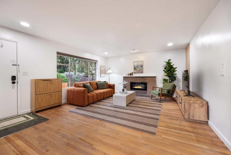 Elegantly designed living room with modern furnishings in an apartment at Building 35th Avenue Northeast - snowballrentals - 1571577 in Seattle, Seattle