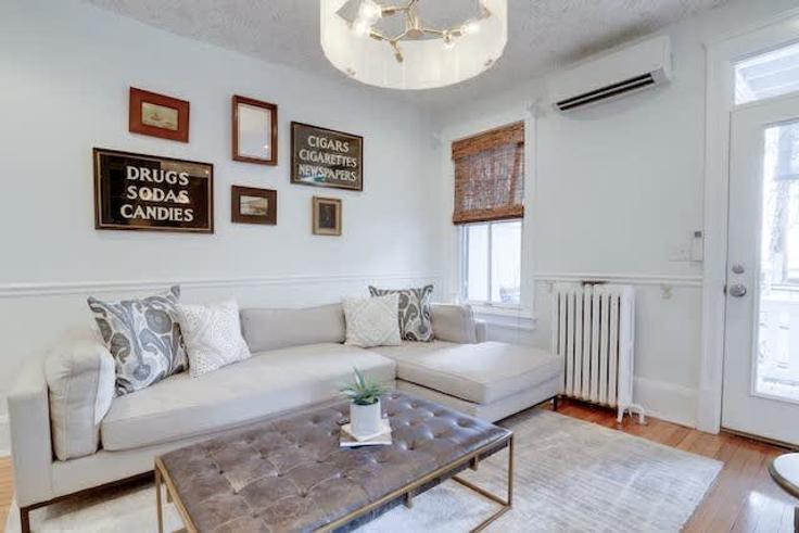 Salle de séjour élégante avec mobilier moderne dans un appartement à Building 6th Street Southeast - sojourn-guesty - 1013264 à Washington, Washington Salle de séjour élégante avec mobilier moderne dans un appartement à Building 6th Street Southeast - sojourn-guesty - 1013264 à Washington, Washington