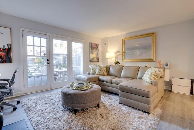 Elegantly designed living room with modern furnishings in an apartment at Building C Street Southeast - sojourn-guesty - 1013236 in Washington, Washington Elegantly designed living room with modern furnishings in an apartment at Building C Street Southeast - sojourn-guesty - 1013236 in Washington, Washington
