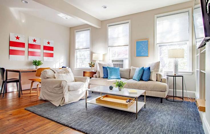 Elegantly designed living room with modern furnishings in an apartment at Building Granby Street - sojourn-guesty - 1542449 in Washington, Washington Elegantly designed living room with modern furnishings in an apartment at Building Granby Street - sojourn-guesty - 1542449 in Washington, Washington