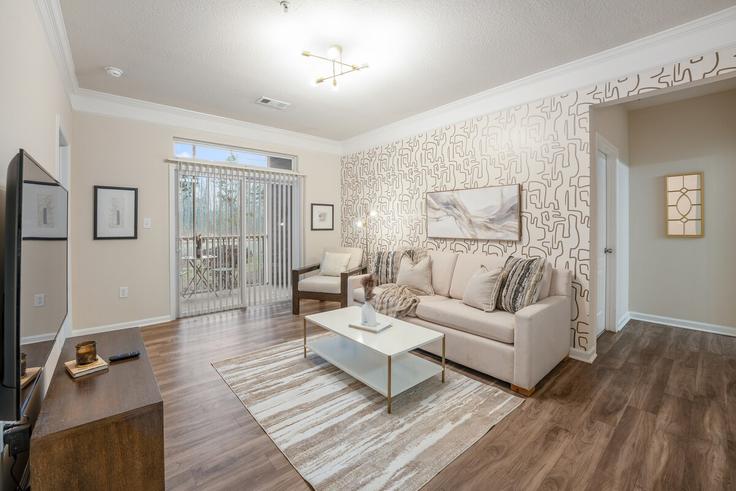 Elegantly designed living room with modern furnishings in an apartment at Building Carolina Drive - solace-escapes - 1531859 in Ridgeland, Ridgeland