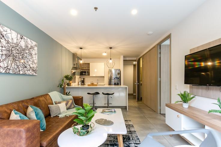 Salle de séjour élégante avec mobilier moderne dans un appartement à Building Calle 3 Sur - soul-management-sas - 1321296 à El Poblado, Medellín Salle de séjour élégante avec mobilier moderne dans un appartement à Building Calle 3 Sur - soul-management-sas - 1321296 à El Poblado, Medellín